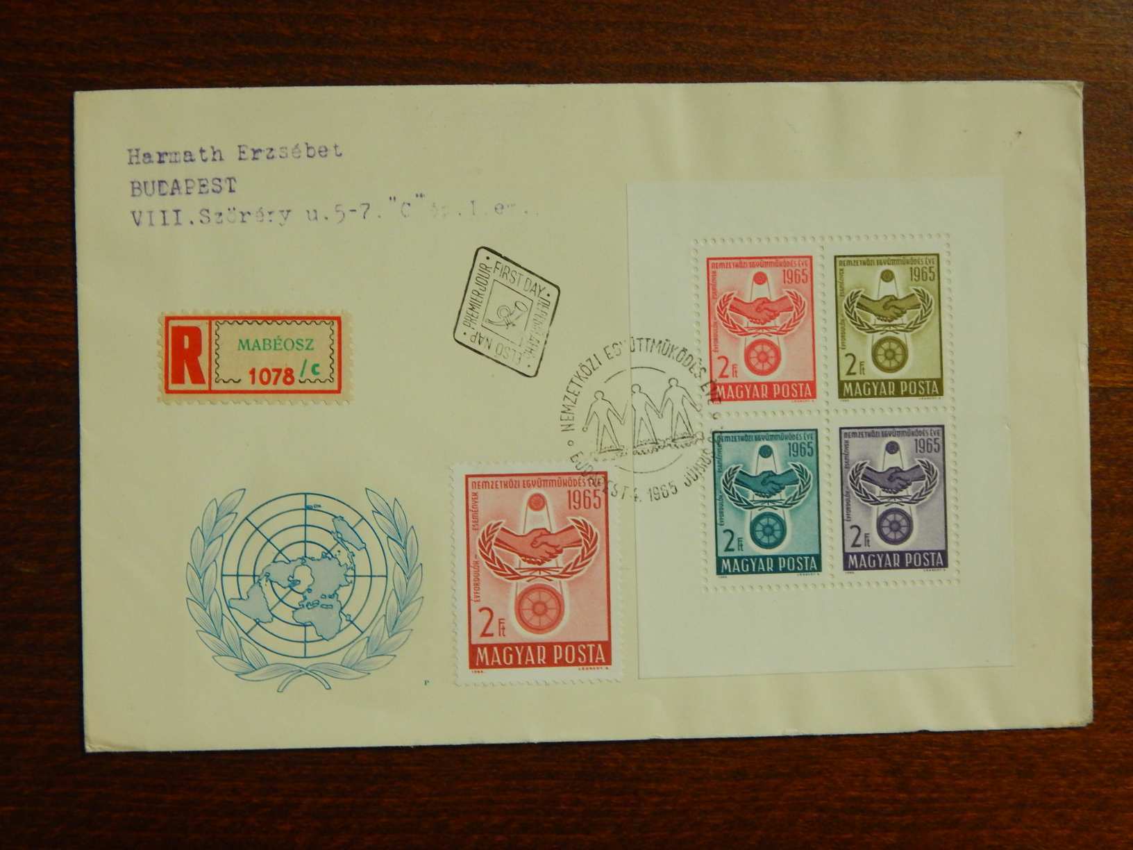 ajánlott ragjegyes FDC 1965. A Nemzetközi Együttműködés Éve kisívvel és egy bélyeg