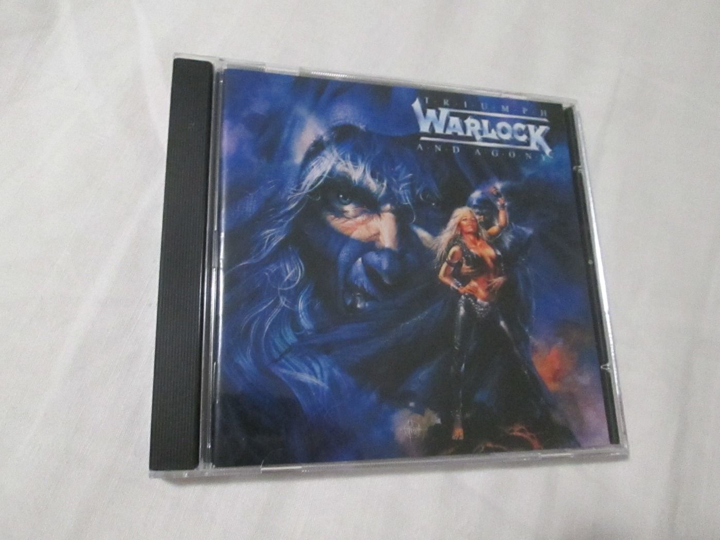 Warlock Triumph and agony            CD
