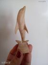 Fából faragott delfin, figura