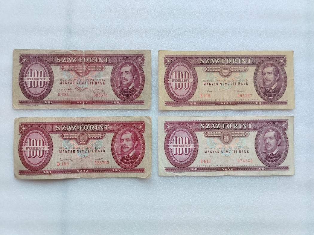 4 db piros 100 forint 4 féle címerrel